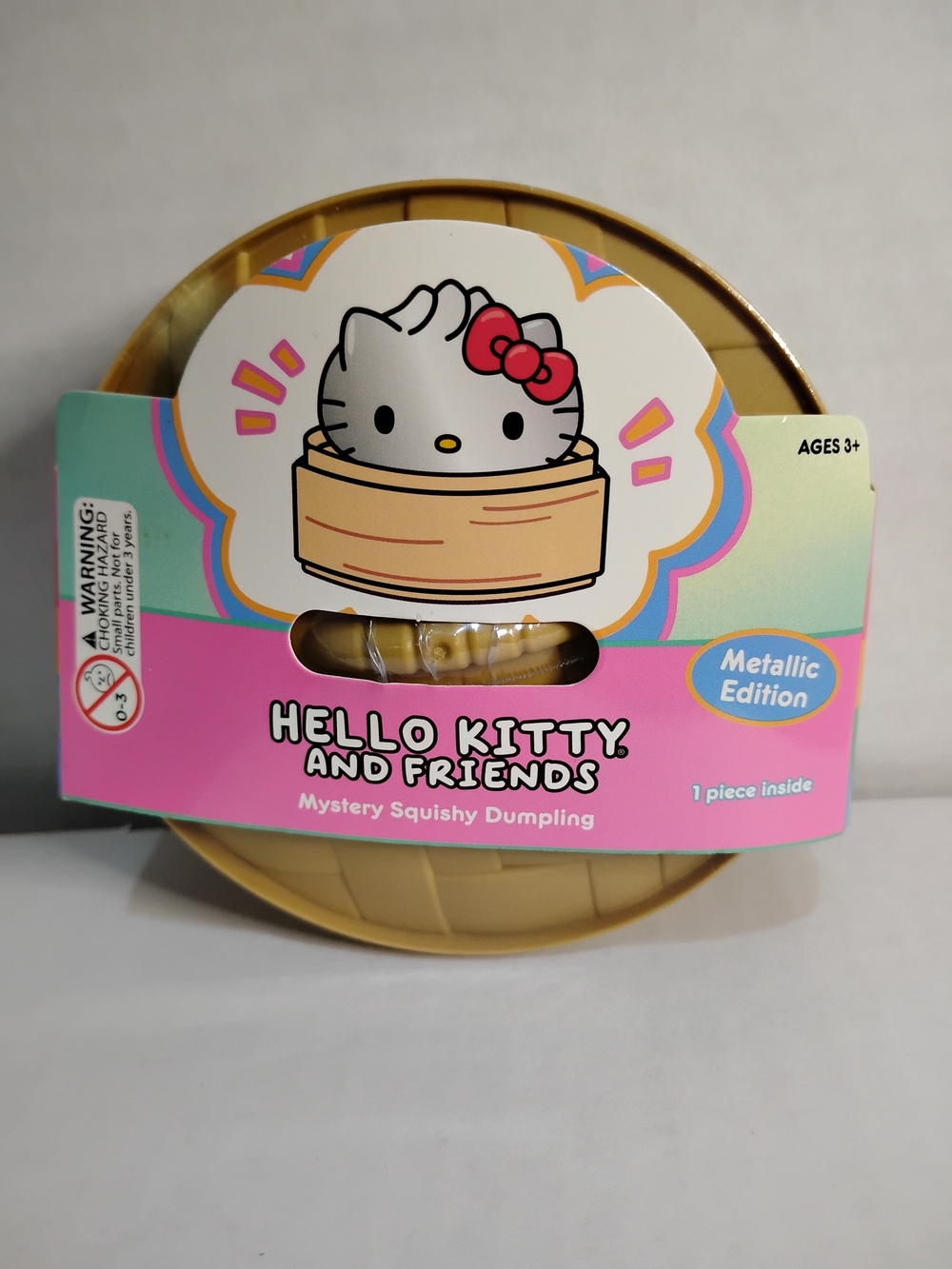 Hello Kitty and Friends Metallic Edition Mystery Squishy Dumpling - Pink & Gold